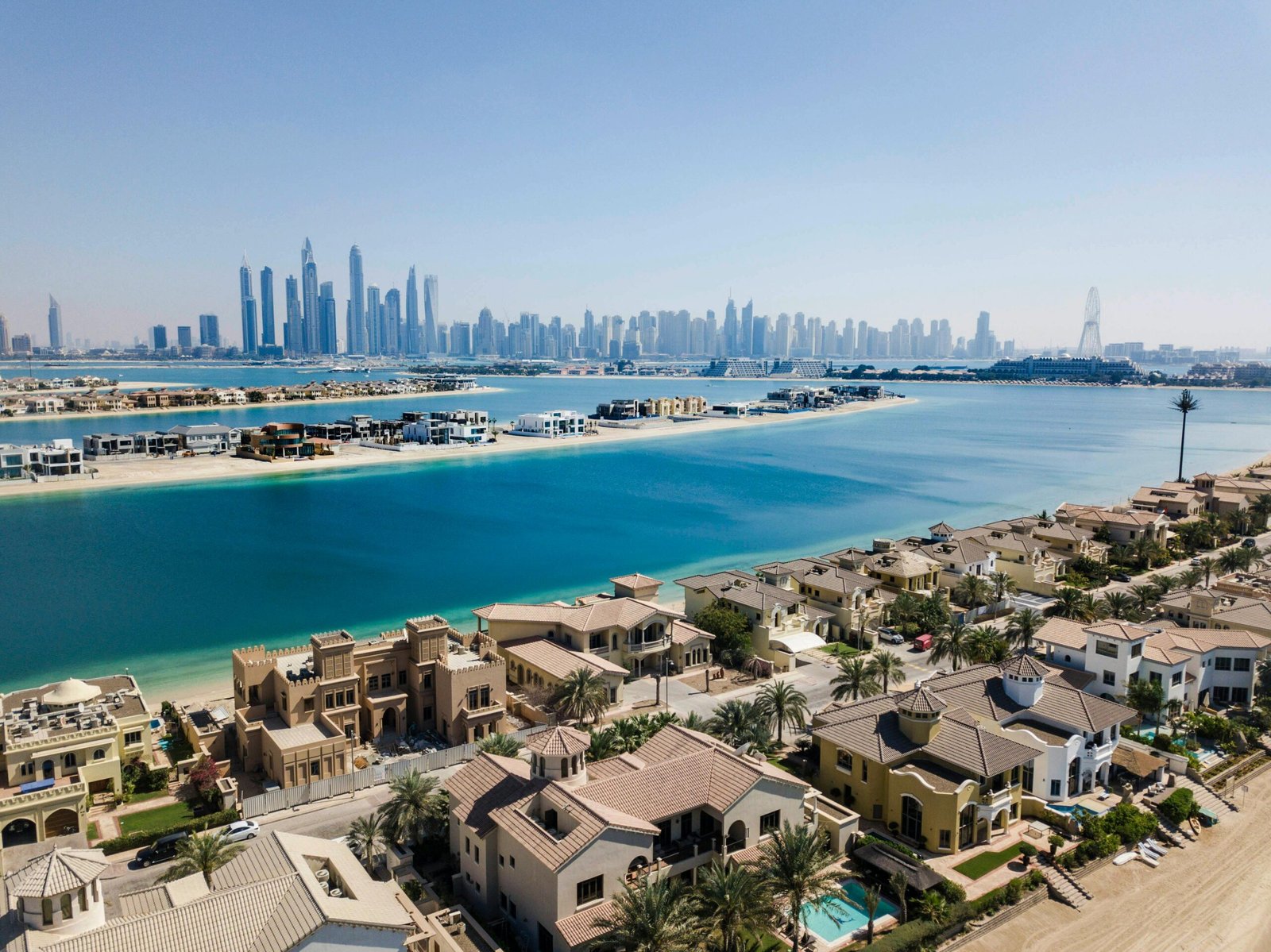 Aerial view of Palm Jumeirah with the Dubai Marina skyline beyond